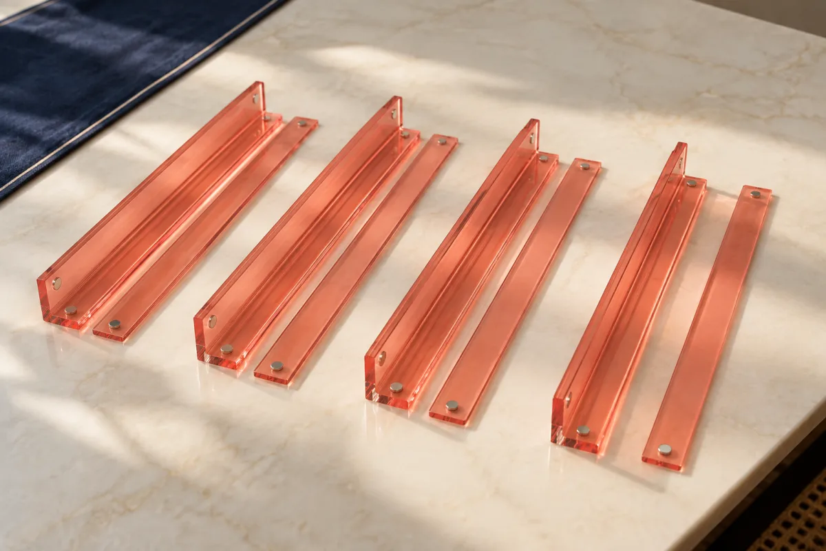 Illustrative four coral acrylic racks and separate pusher bars