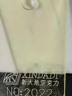 Photographed Xindadi cast acrylic chip, code 2022, translucent pale lime tint