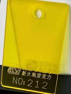 Photographed Xindadi cast acrylic chip, code 212, translucent golden yellow tint