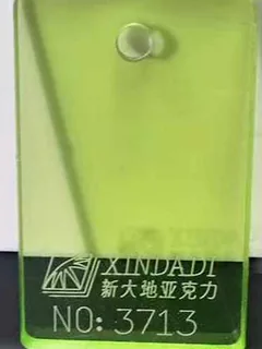 Photographed Xindadi cast acrylic chip, code 3713, translucent pale yellow-green tint