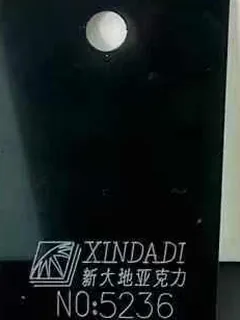 Photographed Xindadi cast acrylic chip, code 5236, opaque jet black
