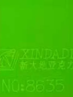 Photographed Xindadi cast acrylic chip, code 8635, translucent fluorescent green