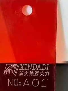 Photographed Xindadi cast acrylic chip, code A01, opaque signal red