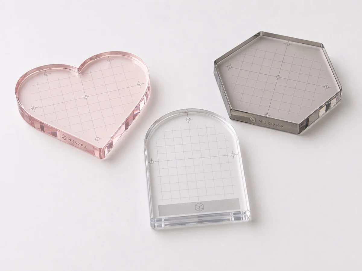 Custom-shape acrylic stamp blocks in heart, arch, and hexagon profiles