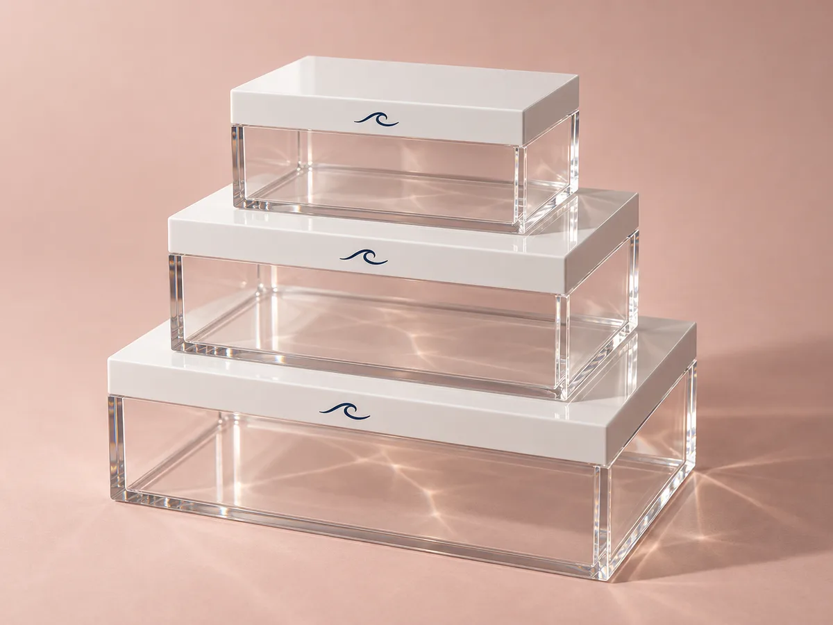 Set of acrylic boxes silk-screened with a navy wave logo