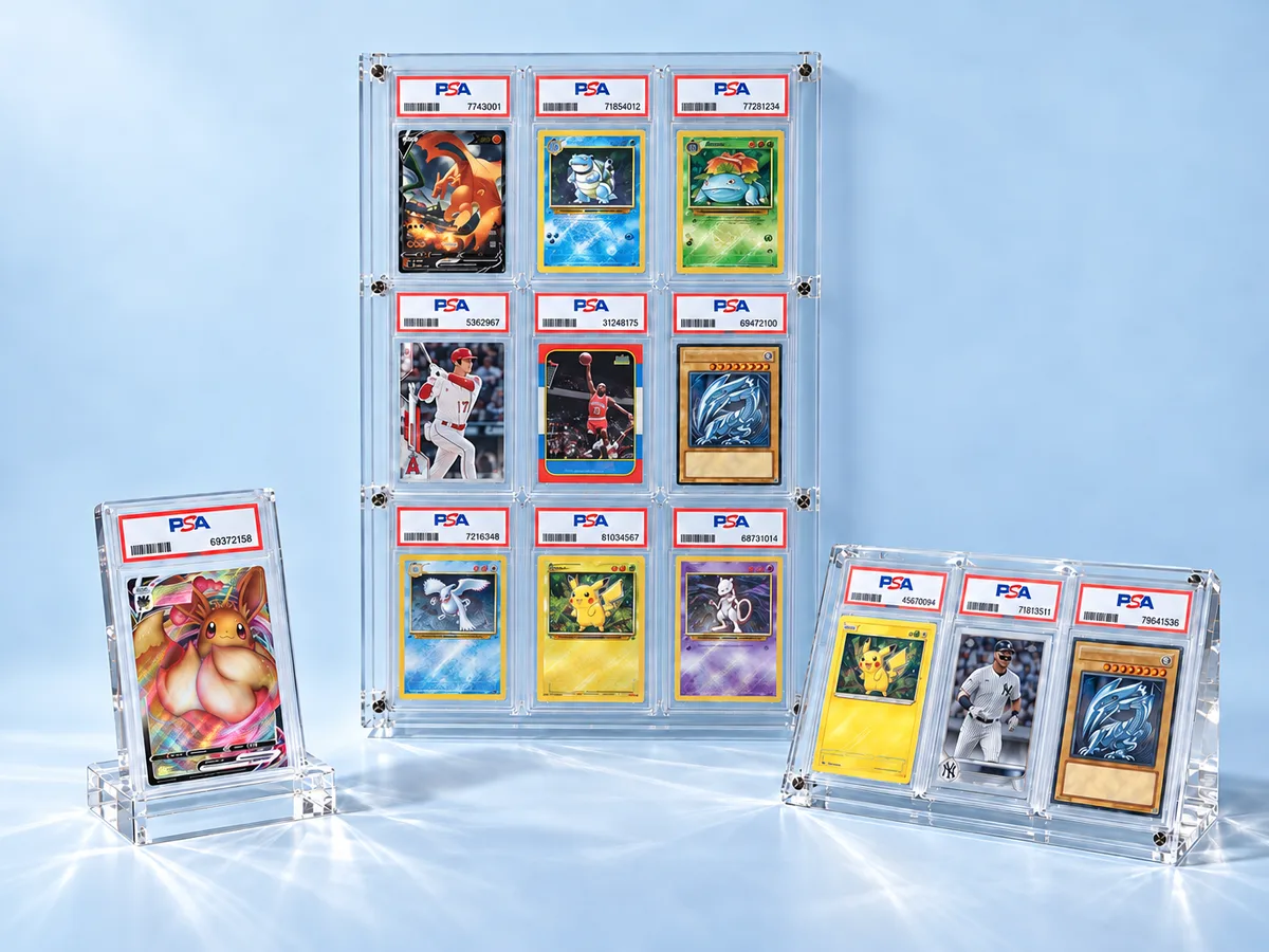 Graded card display cases: a single-slab stand, a three-slab angled stand and a nine-slot wall rack holding PSA slabs
