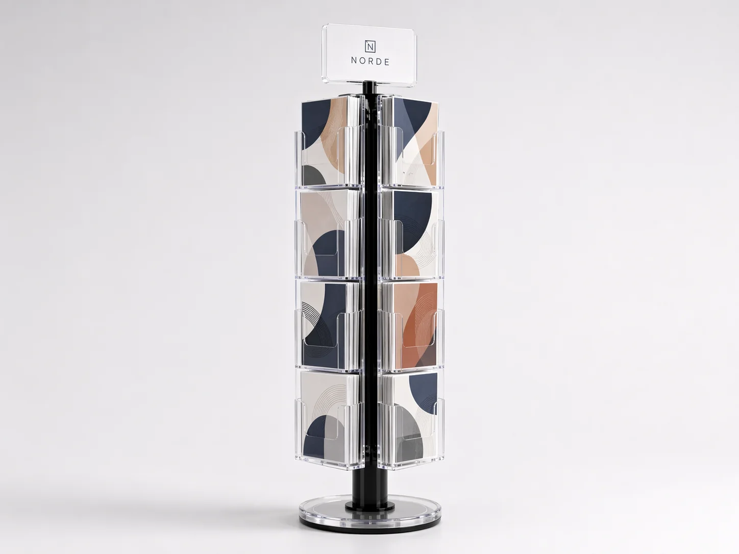 Floor-standing rotating acrylic brochure carousel with multiple brochure faces around a central post