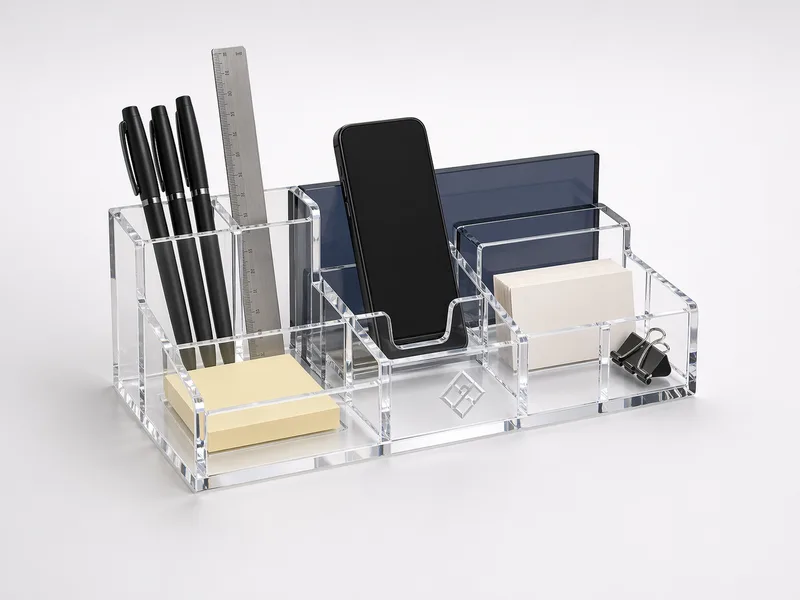 Custom clear acrylic desk caddy with stepped compartments, phone slot, and office supplies