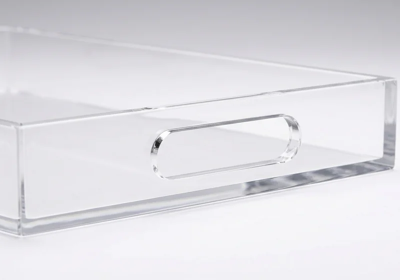 Acrylic tray with cut-out handles