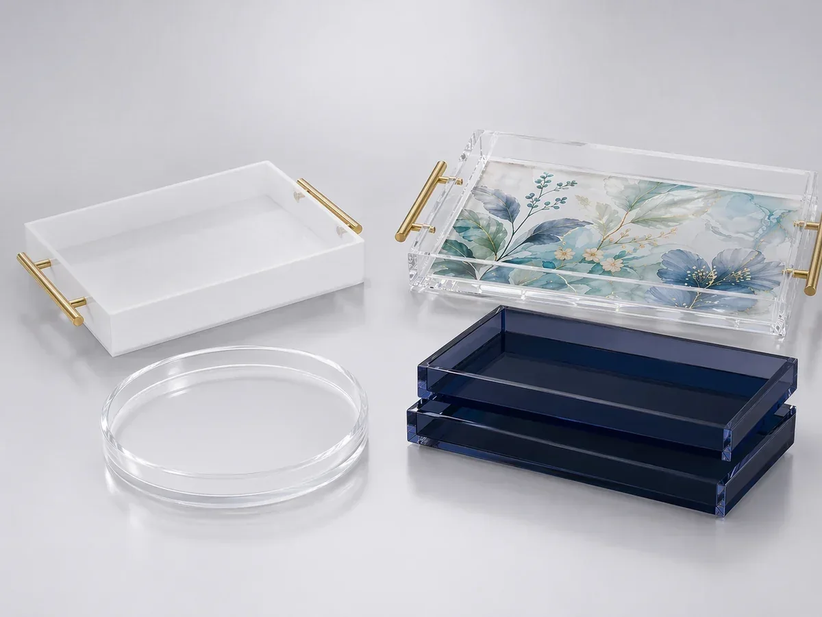 Collection of custom acrylic trays — serving, vanity, and decorative designs