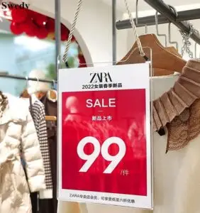 acrylic sign holder in retail shop